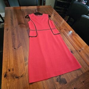 Tory Burch Womens dress size small. Never worn.Fine red knit with leather detail